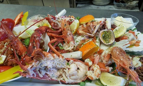 Menu di pesce da 3 o 4 portate con vino per 3 o 4 persone al Ristorante Pizzeria La Caveja (sconto fino a 50%)