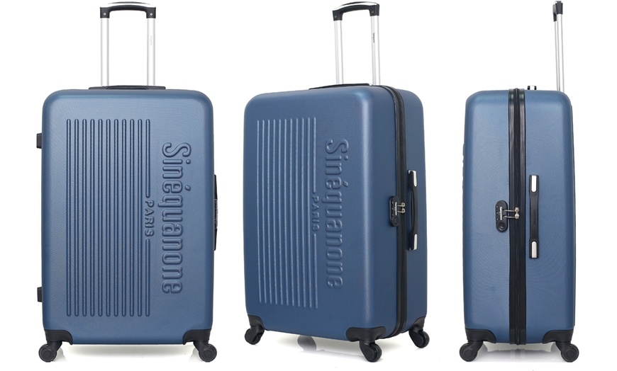 Image 38: Set of Three Suitcases