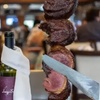 Image 2: $50 or $100 towards All-you-can-eat Brazilian Steak Dinner Experience