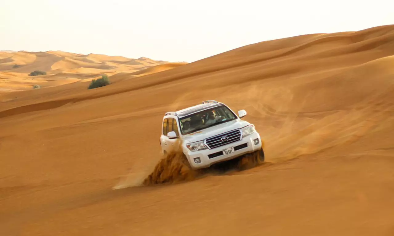 Desert Safari w/ Centralized Van w/ Optional 30-min Quad Bike, & More