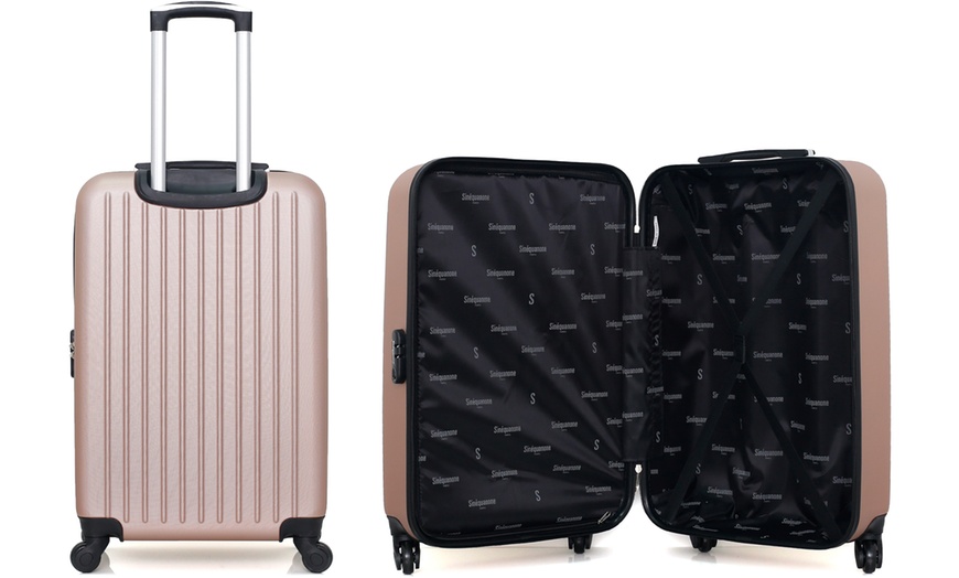 Image 34: Set of Three Suitcases