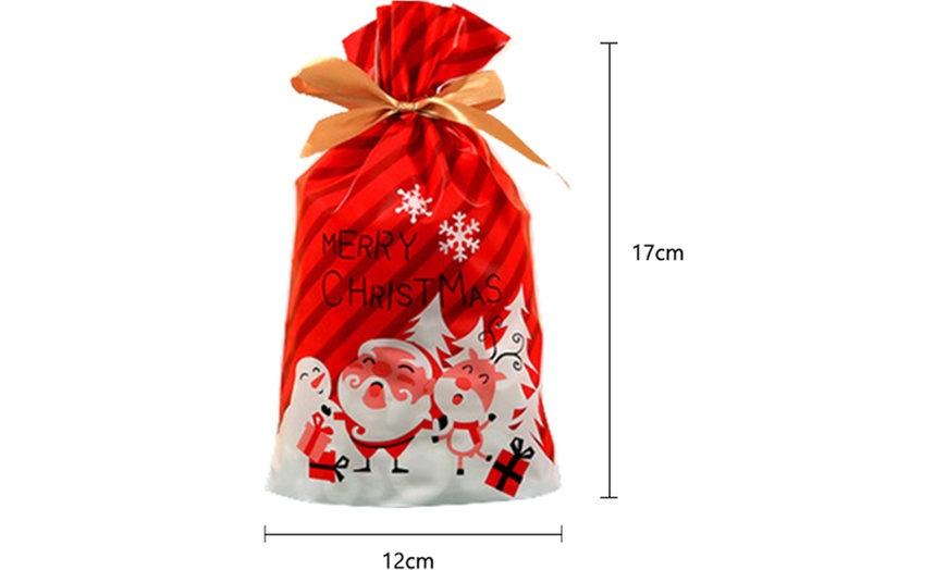 Image 8: 50-Piece Christmas Drawstring Gift Bag Set