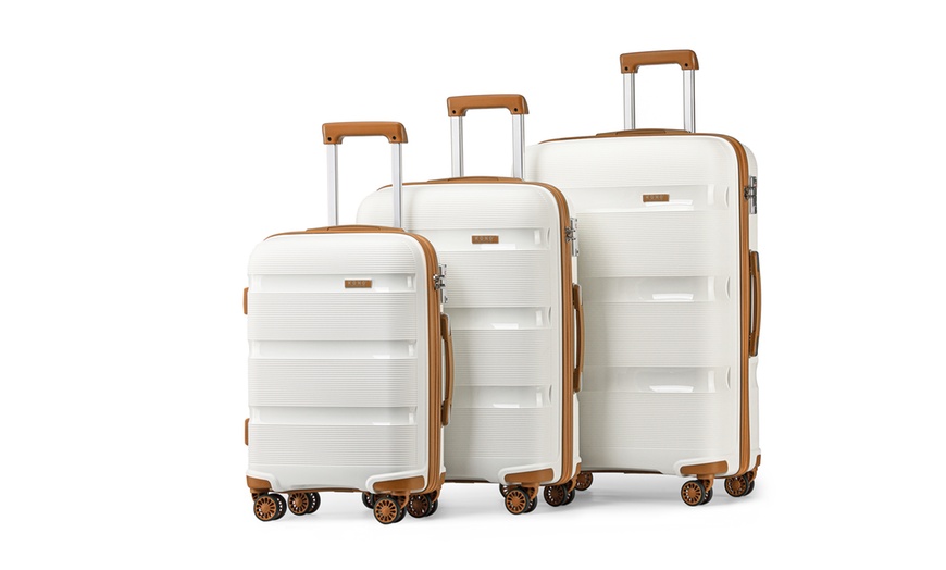 Image 1: One or Three Kono Suitcases