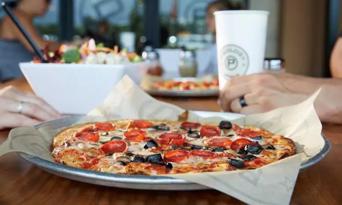 Two or Four Personalized Pizzas with Unlimited Toppings at Pieology Pizzeria in Carson (33% Off)  - Primary Image