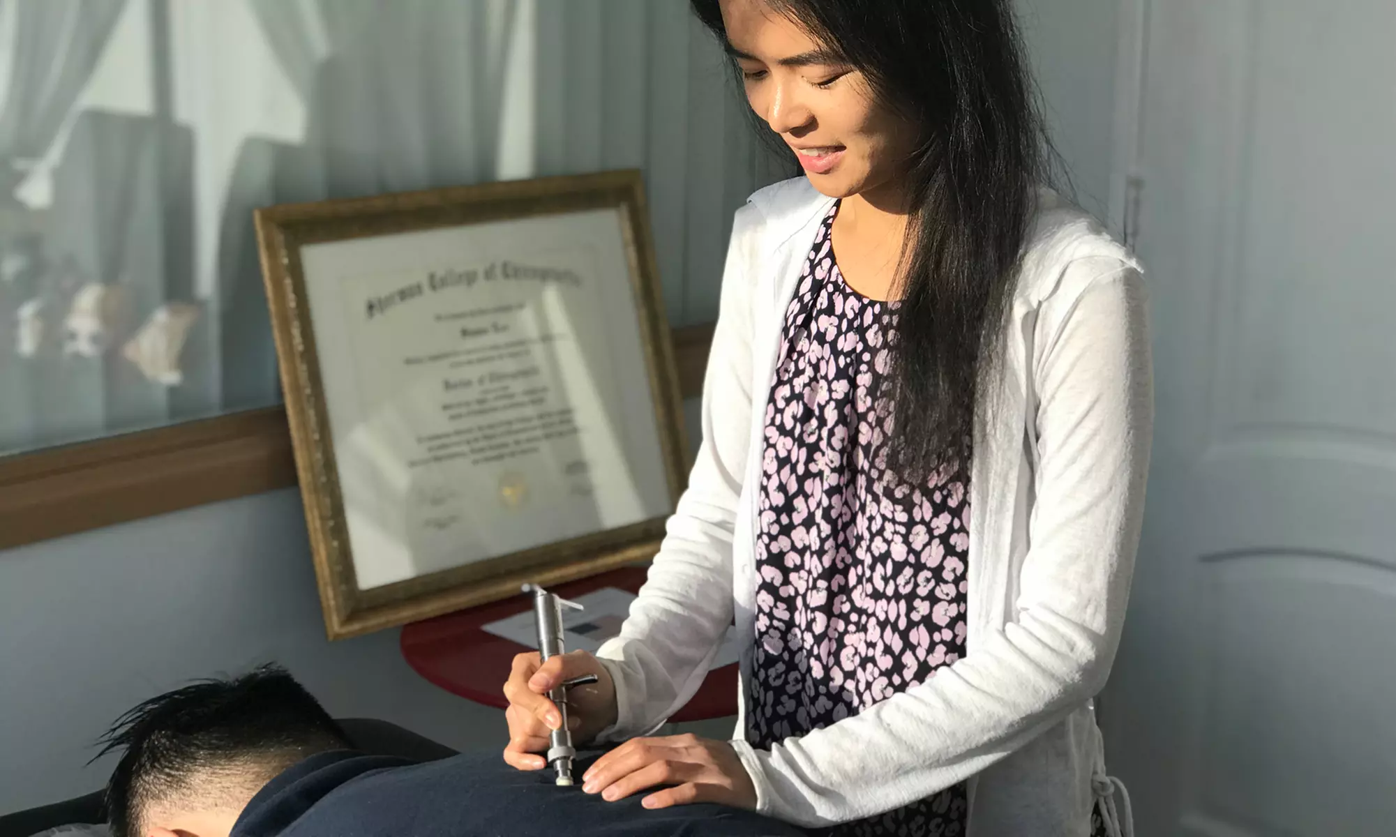 Initial Consultation, Exam, and One or Three Adjustments at Flourish Family Chiropractic (Up to 76% Off) - Primary Image