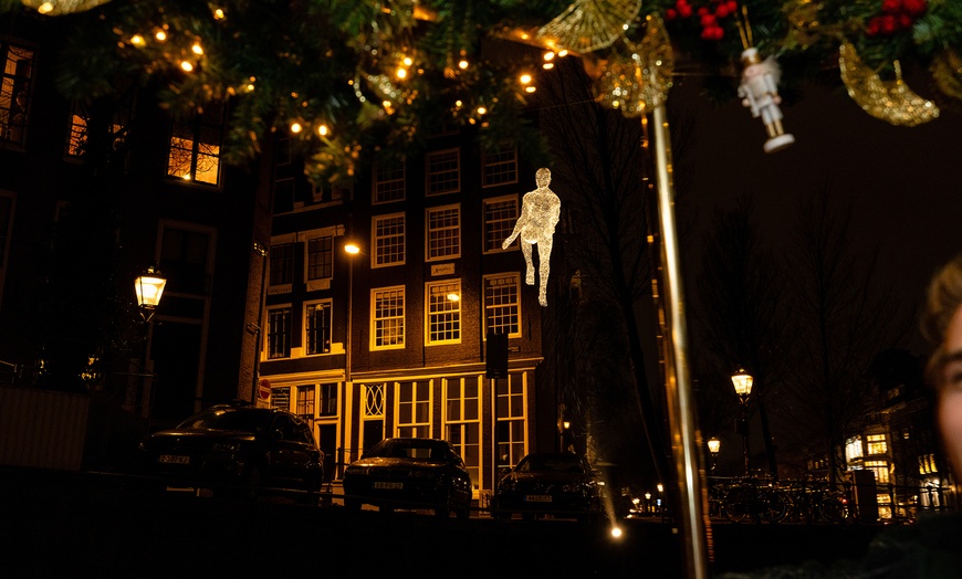 Image 12: Amsterdam Light Festival vanaf het water in een elektrische salonboot
