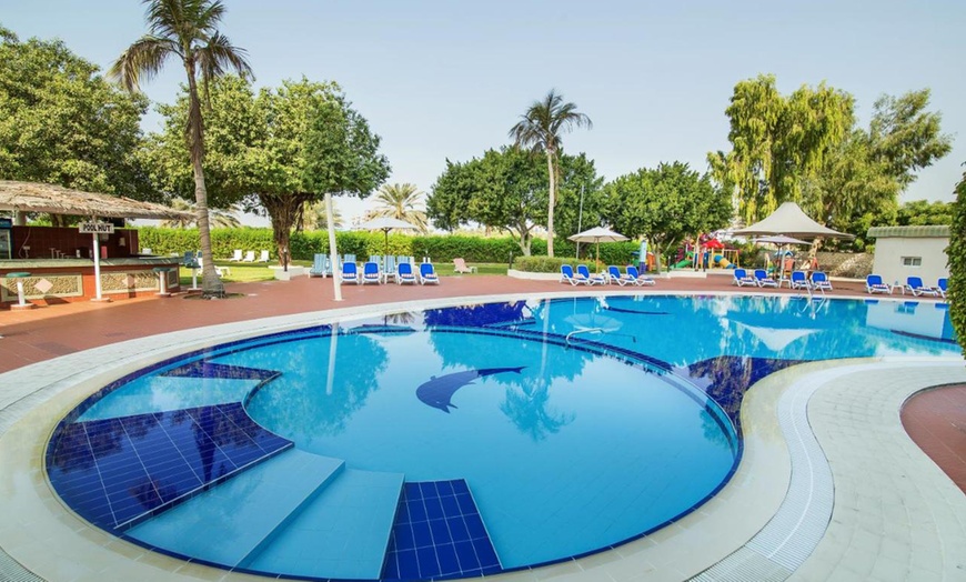 Image 2: Light snacks and refreshing beverage all day by the pool 