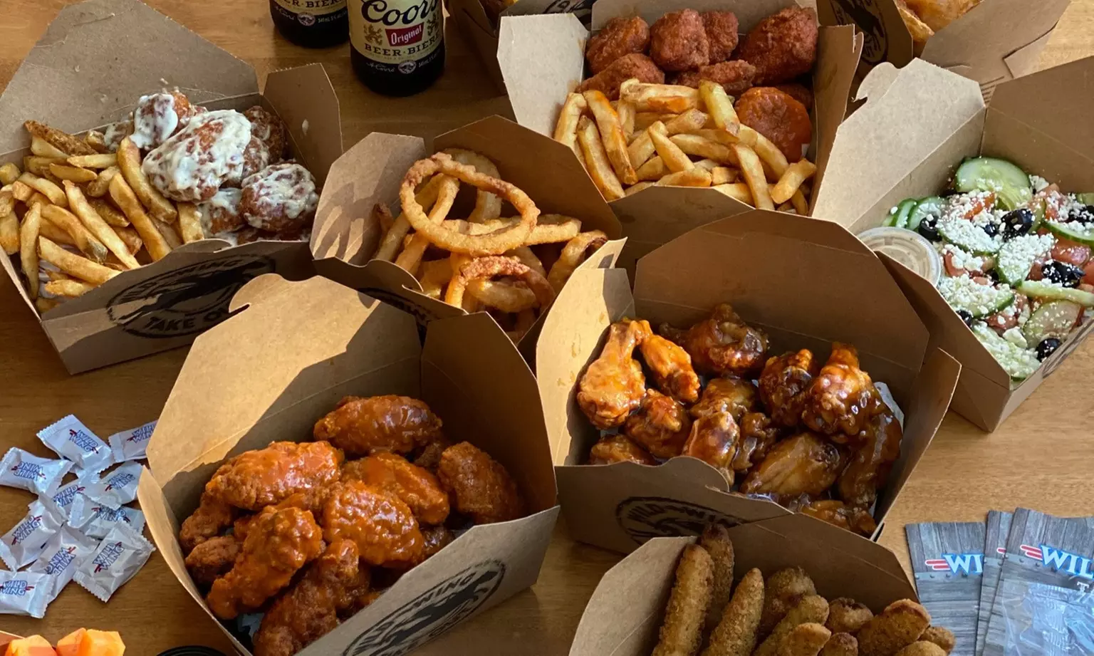 Wings Combo Packages or Family Weekend Special Package at Wild Wing (Up to 13% Off). Five Options Available. - Second Medium