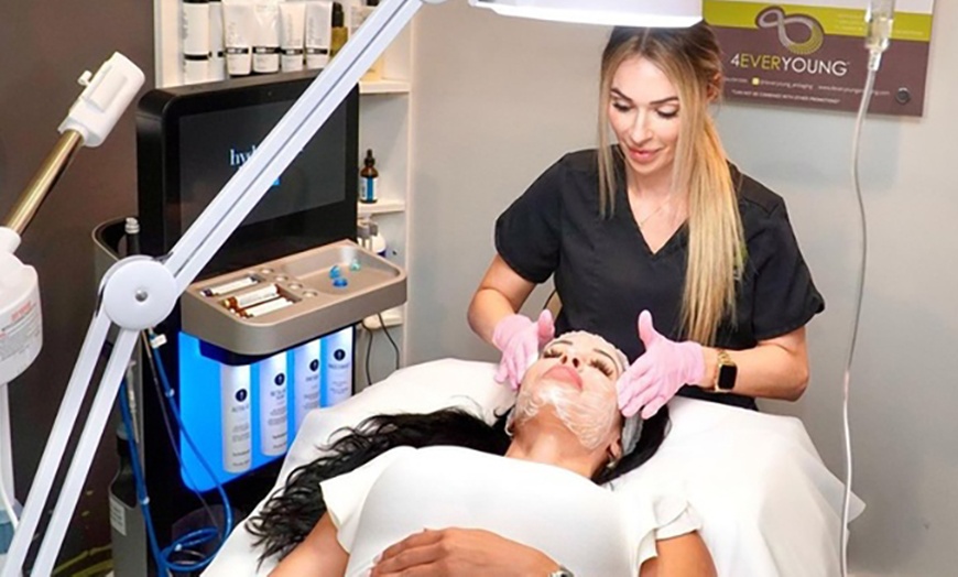 Image 1: Clear skin, your way—try Acne and Customized Facials at 4Ever Young