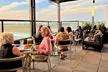 Experience Dining with Runway Views: $50, $75, or $100 Towards Food & Drinks (Up To  31% Off) - Second Medium