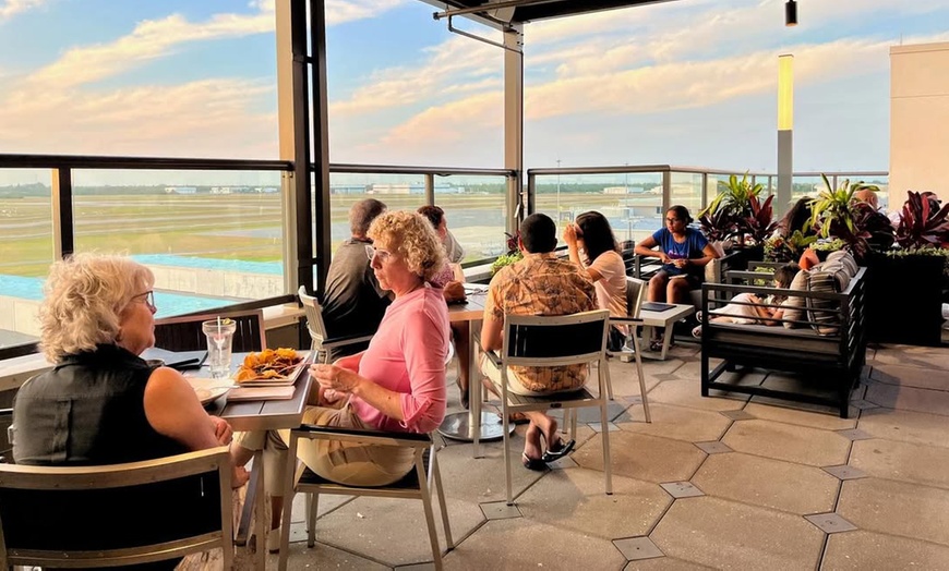 Image 2: Dining with Runway Views: $50, $75, or $100 Towards Food & Drinks 
