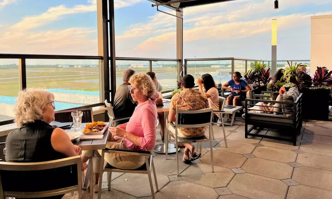 Dining with Runway Views: $50, $75, or $100 Towards Food & Drinks 