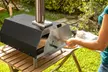 Horno de pellets para pizza con pala y bolsa de transporte, de Innovagoods - Second Medium