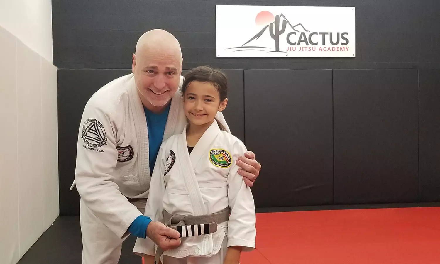 Experience Cactus Jiu Jitsu Academy's dynamic classes for all ages with options like five class passes and up to 50% off - Primary Image