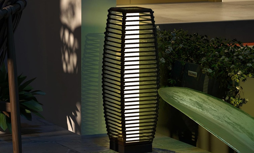 Image 1: Outsunny Rattan-Effect Solar Floor Lamp