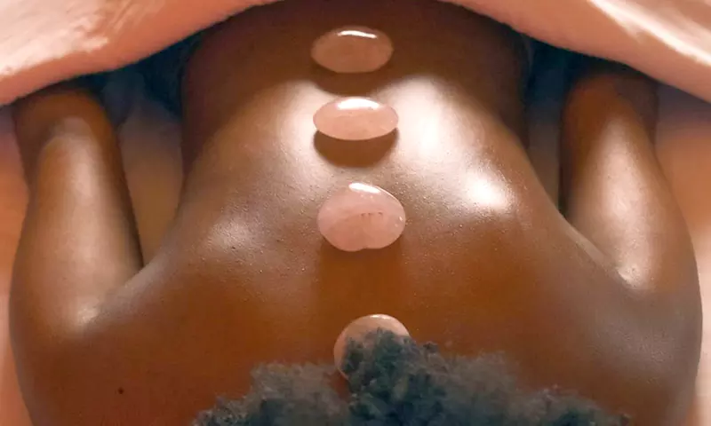 1-Hour Therapeutic, Deep Tissue, or Hot Stone Massage w/Aromatherapy & More at A Touch With Love (Up to 32% Off) - Primary Image