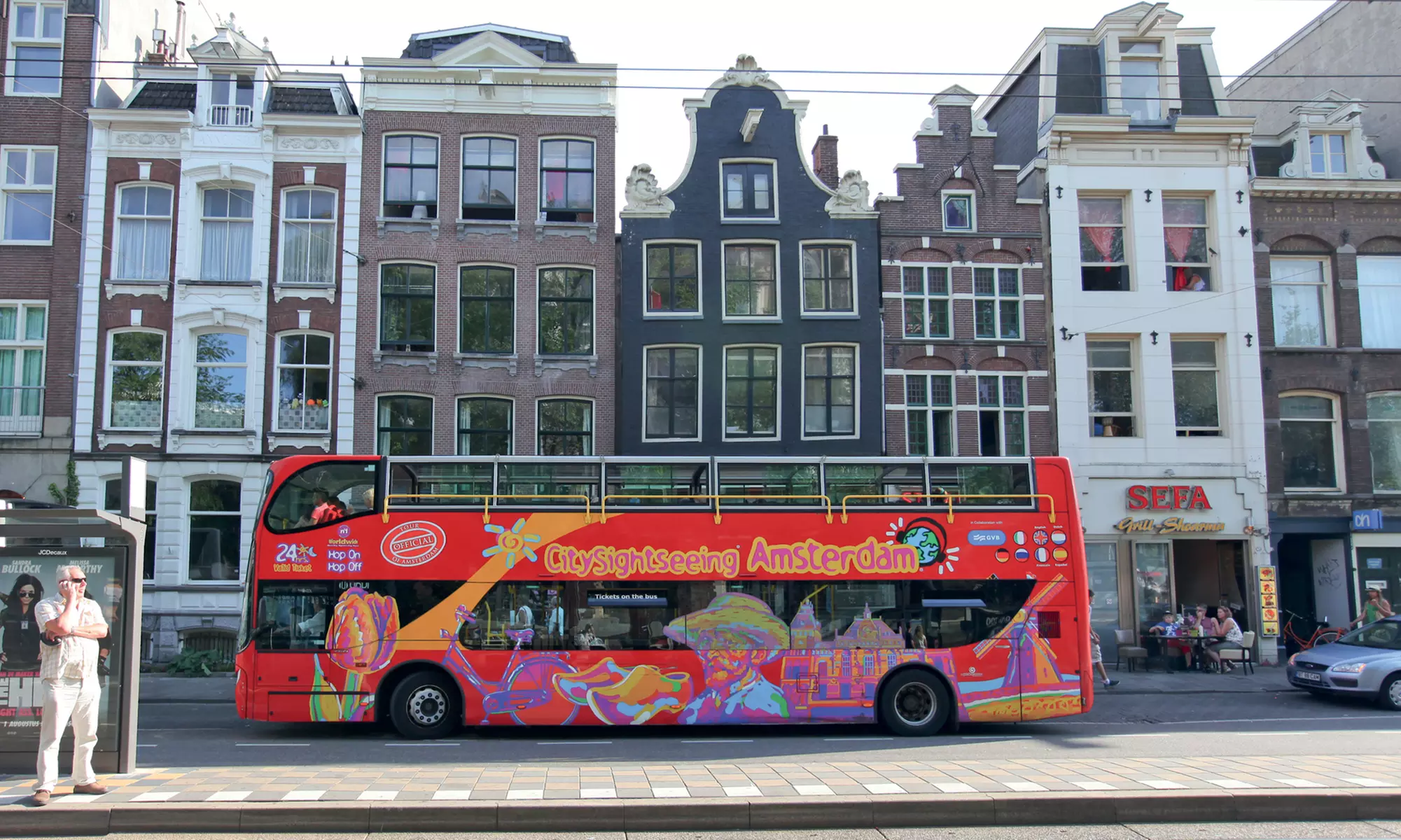 Verken Amsterdam met een 24-uurs Hop-on hop-off bus- en bootticket