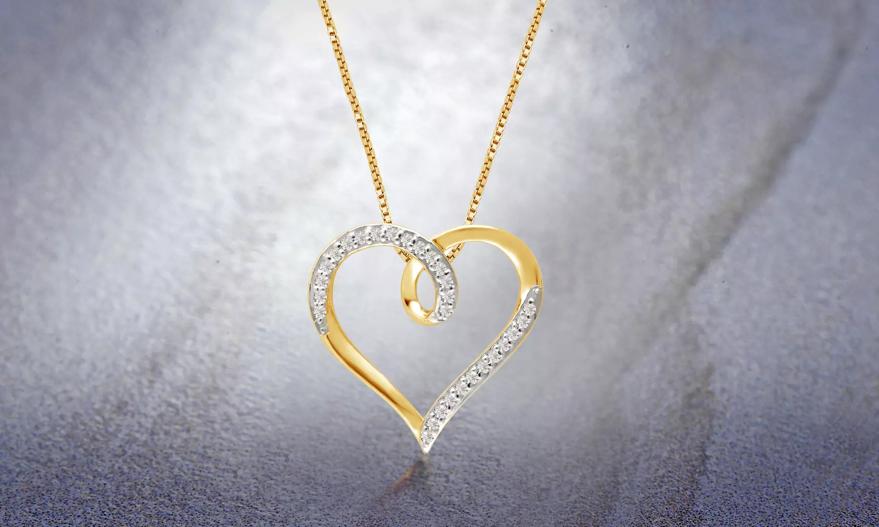 1/10 CTTW Diamond Heart Loop Pendant in 10K Gold by DiamondMuse - Primary Image