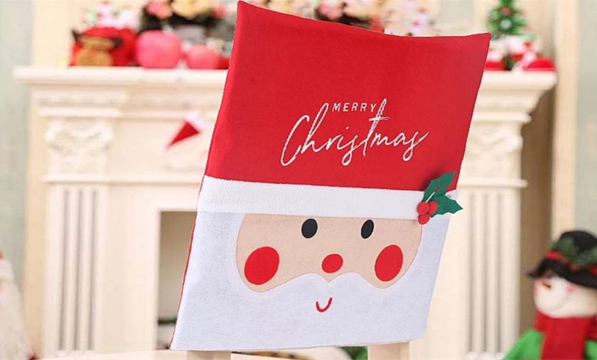 Image 3: Pack of Two or Four Festive Santa Chair Covers