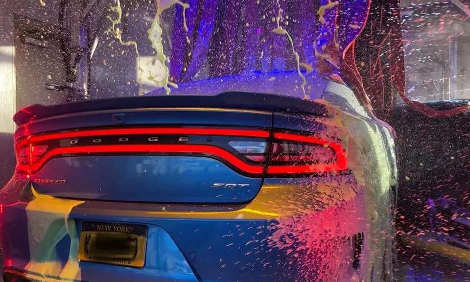 Three or Five Deluxe, Super Deluxe, or Manager's Special Packages at Grand Slam Car Wash (Up to 55% Off) - Primary Image