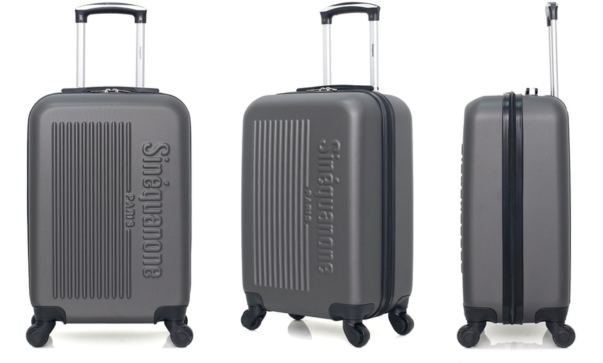 Image 21: Set of Three Suitcases