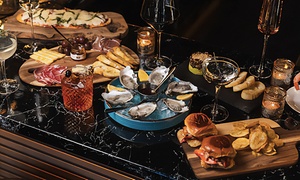 Chic West Village Wine Bar: Dinner for Two with Cocktails or $100 Dining Credit at Nightingale (Up to 45% Off)