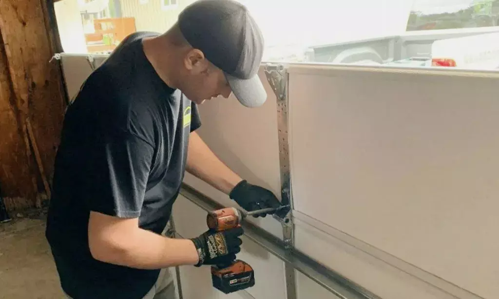 Garage Door Tune Up & Inspection with Optional Remote Program or $200 Toward Door Installation (Up to 87% Off) - Primary Image