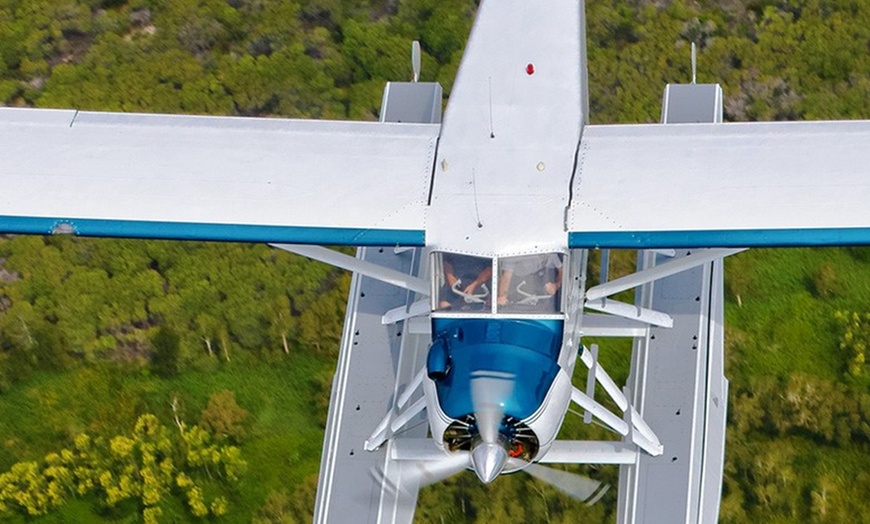 Image 1: Scenic Flight for Up to Six