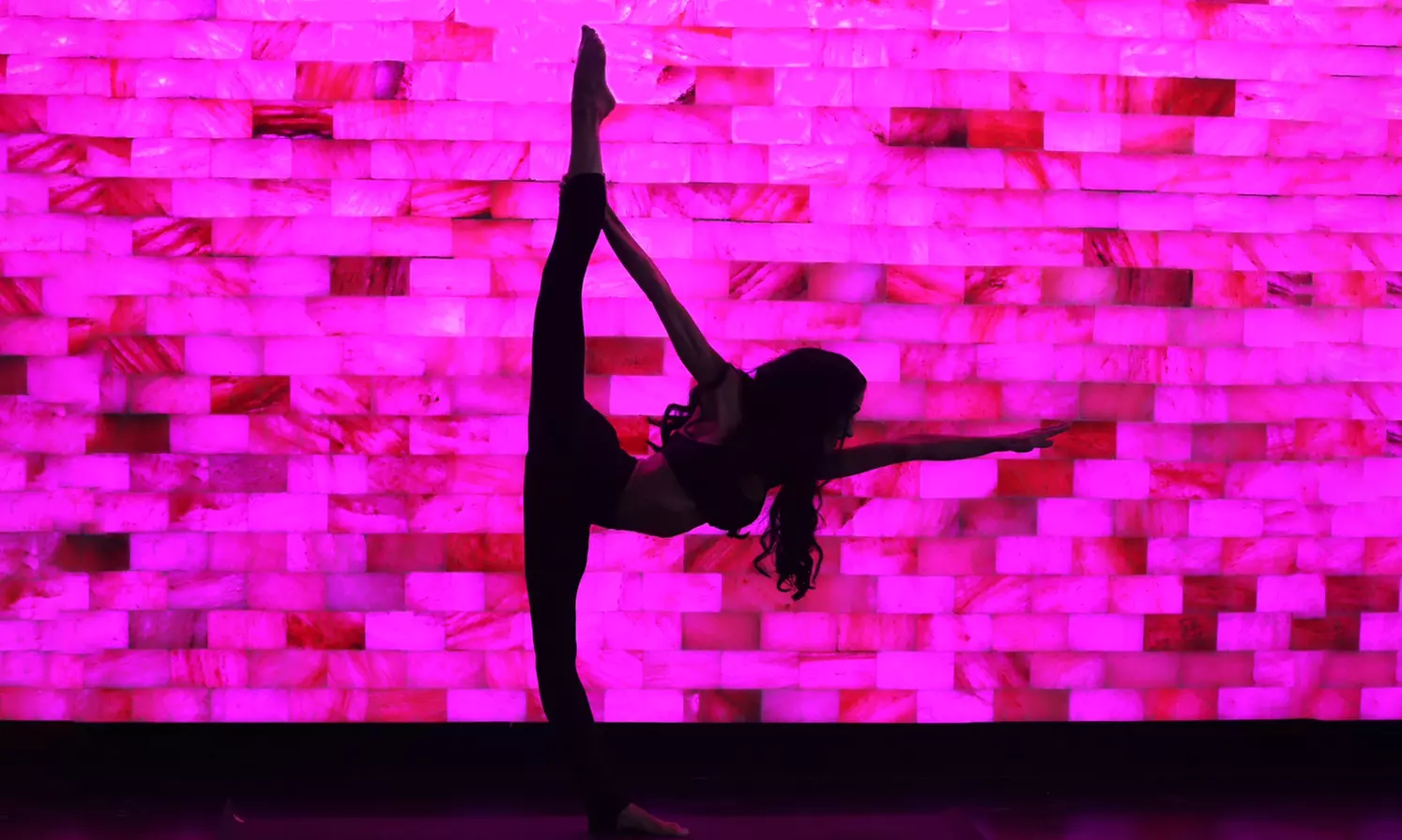 5 or 10 Yoga Class Passes at Vibes Hot Yoga (69% Off) - Primary Image