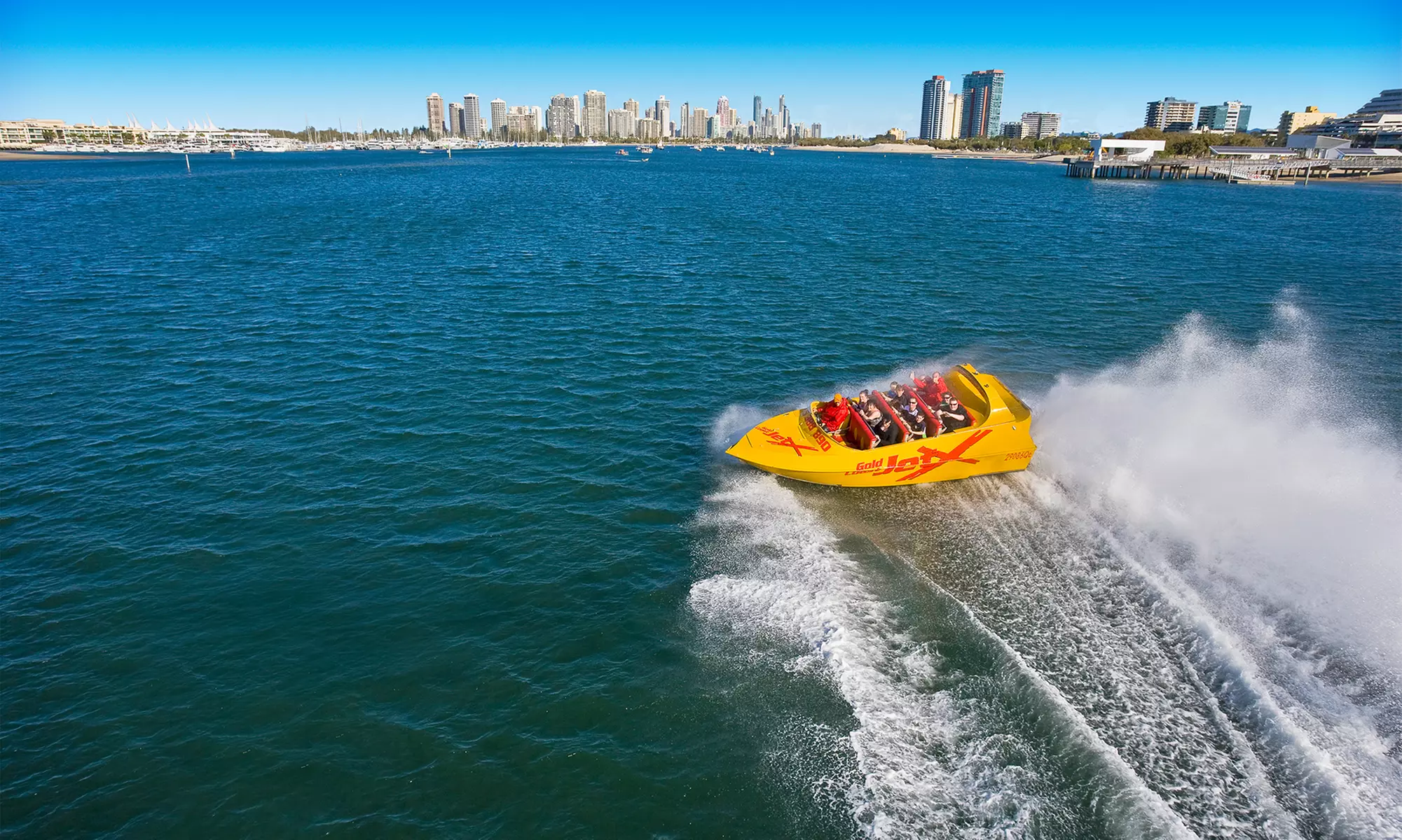 Unforgettable Jet Boat Ride and Surf Lesson for a Child or Adult