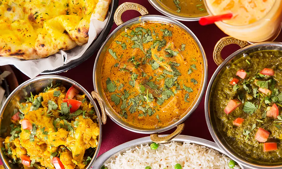 Three-Course Malaysian-Indian Meal + Drink for Two ($29) or Six People ($79) at Riks Mahal Restaurant (Up to $195 Value) - Primary Image