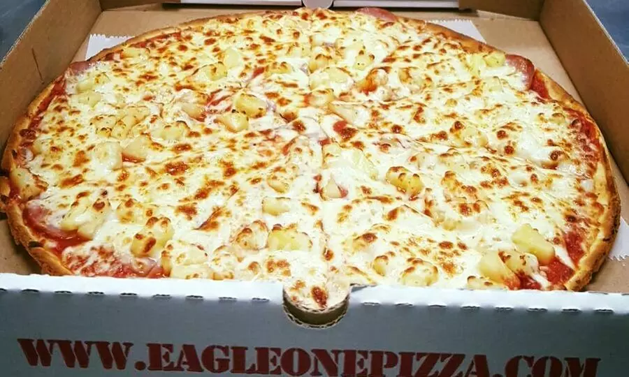 One or Two Large Pizzas w/ Choice of Breadsticks or Cinnamon Sticks at Eagle One Pizza (Up to 33% Off) - Primary Image