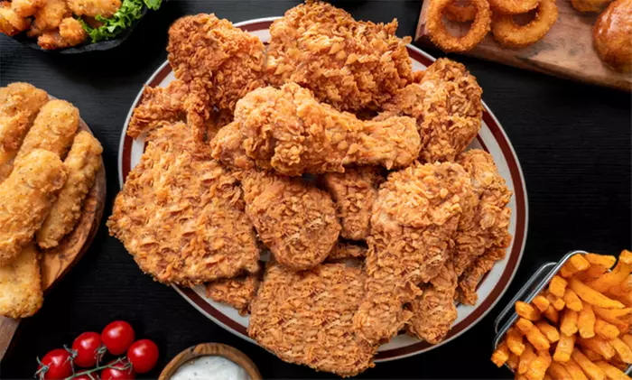 Fish or Chicken Combo and Family Meal Combo at Kajun Chicken & Seafood (Up to 20% Off) - Primary Image