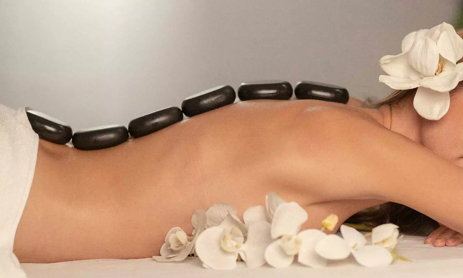 Experience a Soothing 60 or 90 Minute Massage Tailored to your Needs at The Wellness Lounge (Up to 34% Off) - Primary Image