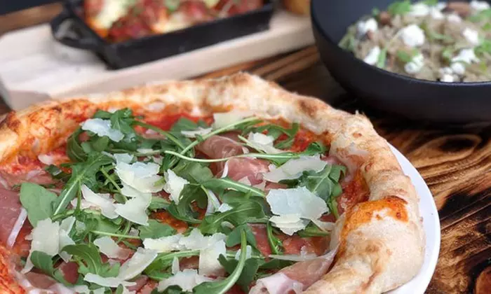 Pizzas + Soft Drinks: 2 ($22) or 4 ($44) - Takeaway; Pizzas + Wine for 2 ($25) or 4 ($50) - Eat-In - Primary Image