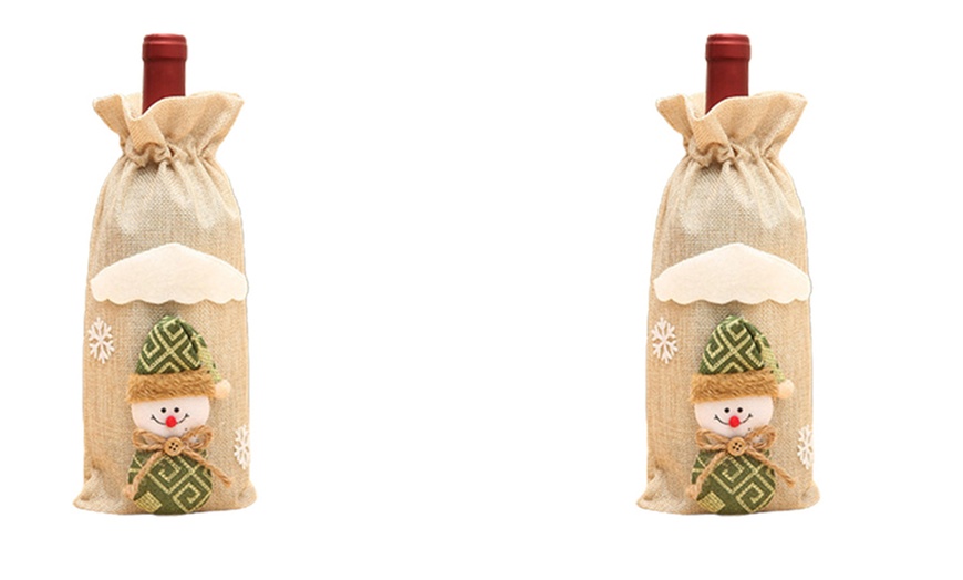 Image 11: One, Two or Four Christmas Wine Bottle Cover Bags