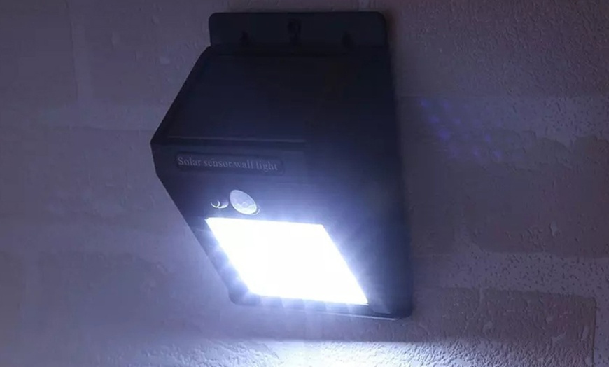 Image 6: Up to Four LED Wall Lights with Solar Panel and 120° Motion Sensor