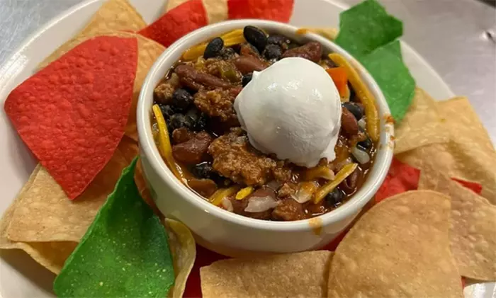 $28 for $40 or $39 for $60 on American Jamaican Casual at The Pint Publik House (Up to 35% Off) - Primary Image