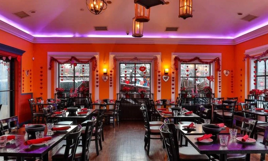 Image 8: Vibrant Rooftop Dining: Choose Meals, Margaritas, or Dining Credit