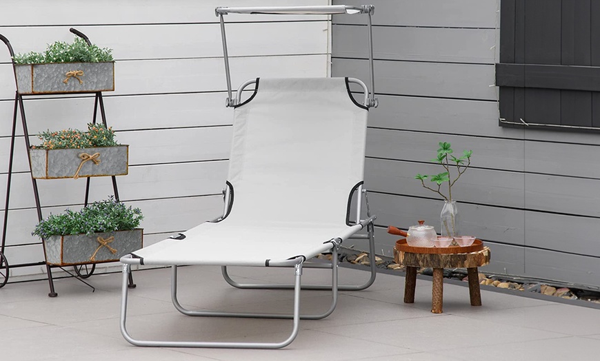 Image 1: Outsunny Foldable Sun Lounger with an Adjustable Back