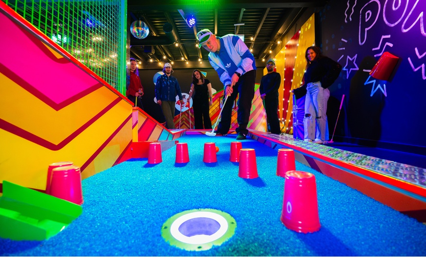 Image 1: Experience wild and thrilling indoor golf w/ wicked cocktails and food