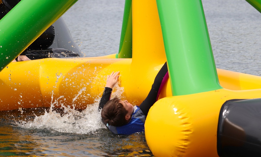 Image 9: Aqua Park Entrance with Wetsuit