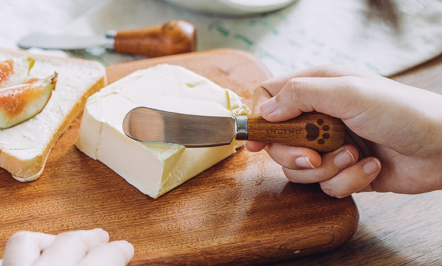 Image 1: Two or Four Standing Butter Knives