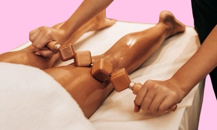 Image 1: Experience Beauty Factory Boutique Spa's wood therapy with various options to reduce cellulite and contour your body, up to 54%