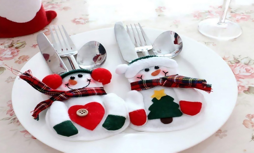 Image 2: Upto 12 Packs of Snowman Xmas Cutlery Holders