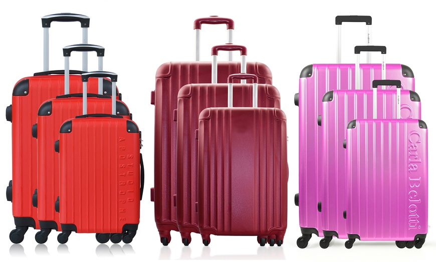 Image 1: Set of Three ABS Suitcases