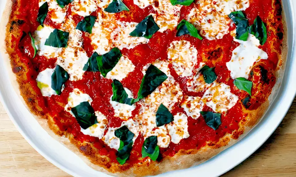 $25 or $50 Towards Authentic Italian Cuisine, Pizza, and Drinks at Dude’s Pizza (Up to 40% Off) - Primary Image