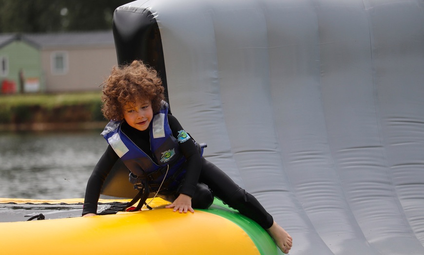 Image 6: Aqua Park Entrance with Wetsuit