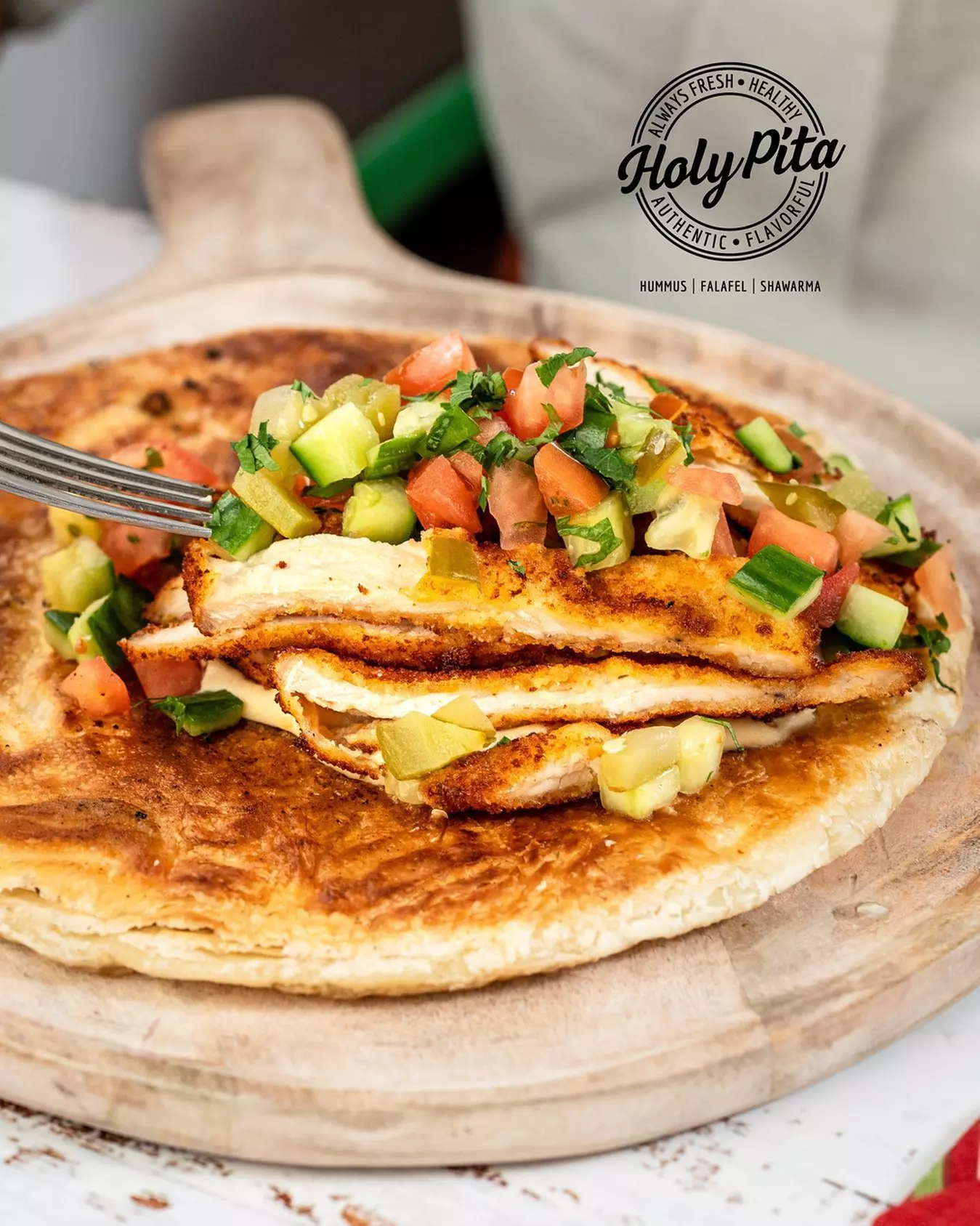 Authentic Mediterranean Delights Await: $30 or $60 to Use at Holy Pita