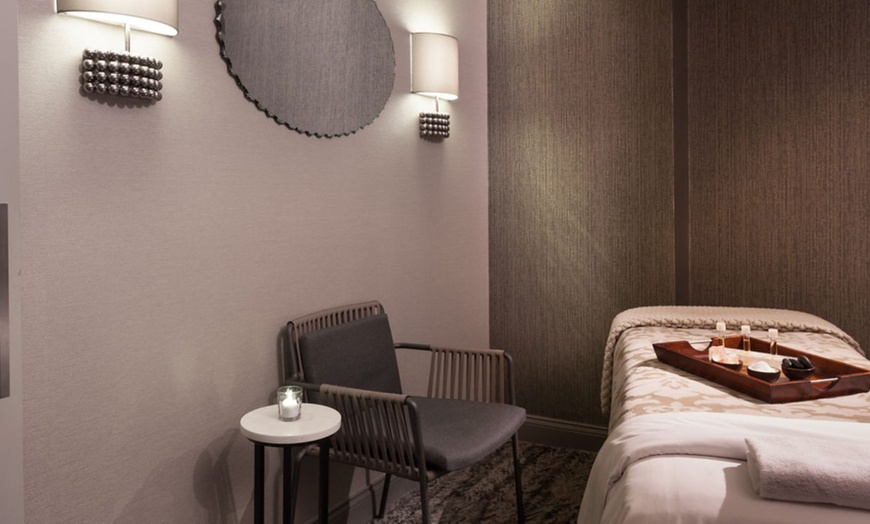 Image 2: Pamper Yourself w/ 80-Minute Massage or Aromatherapy Facial Deals